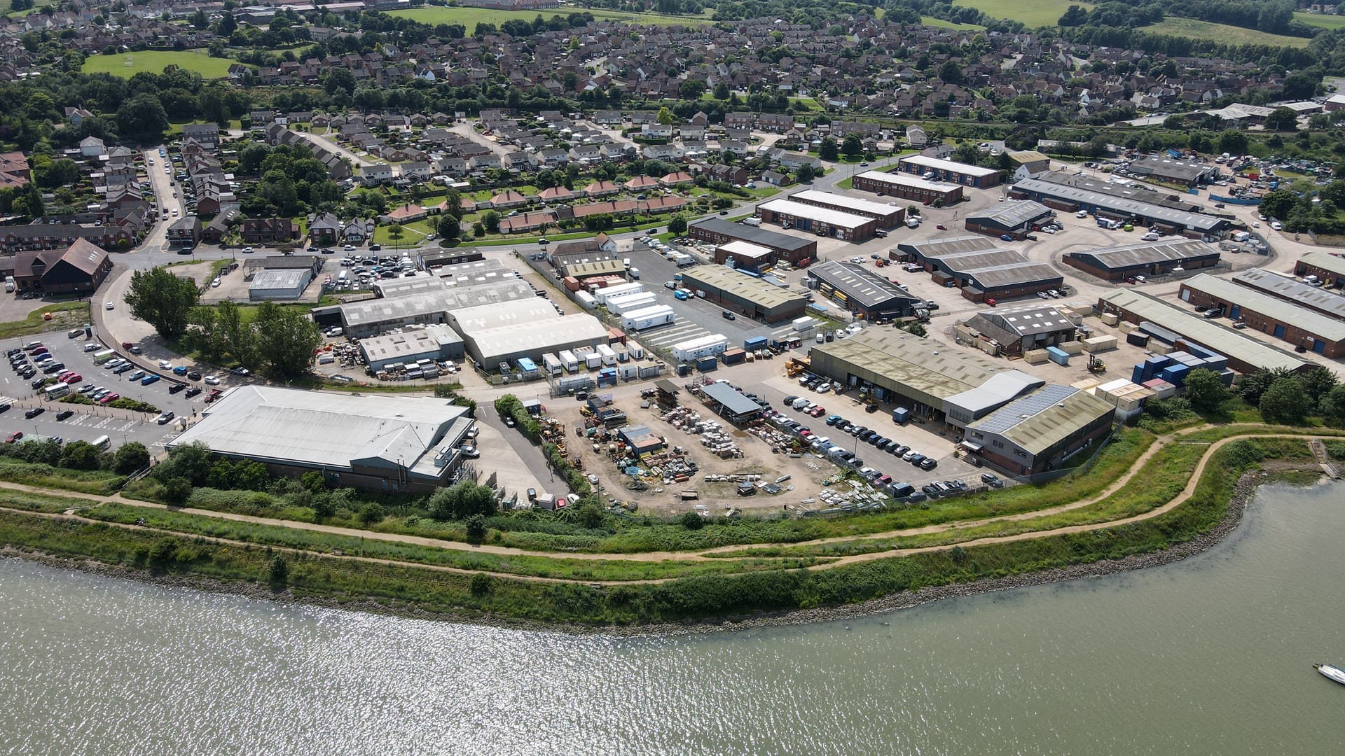 Trading estate Manningtree Town in Essex on river Stour UK drone aerial view